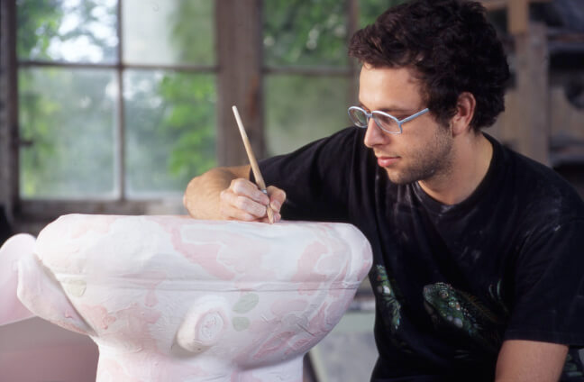 Arts/Industry artist-in-residence Christian Holstad in the Kohler Co. Pottery, 2000. Photo: Kohler Co.